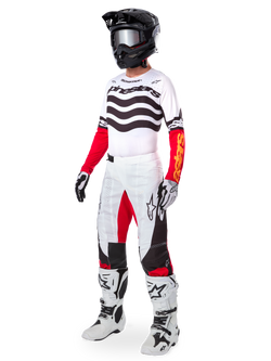 Alpinestars Limited Edition Techstar Deep Gear Set, full motocross racing apparel, white jersey with black wave patterns and red sleeves, white pants with red and black accents, black helmet with silver goggles, white and black gloves, white boots, coordinated MX racing outfit