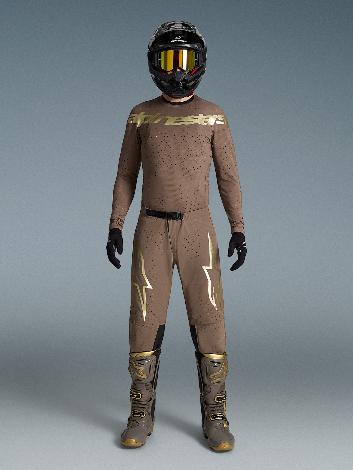 Limited Edition Supertech Air Gold Gear Set, tan motocross outfit with metallic gold logos, matching boots and helmet.