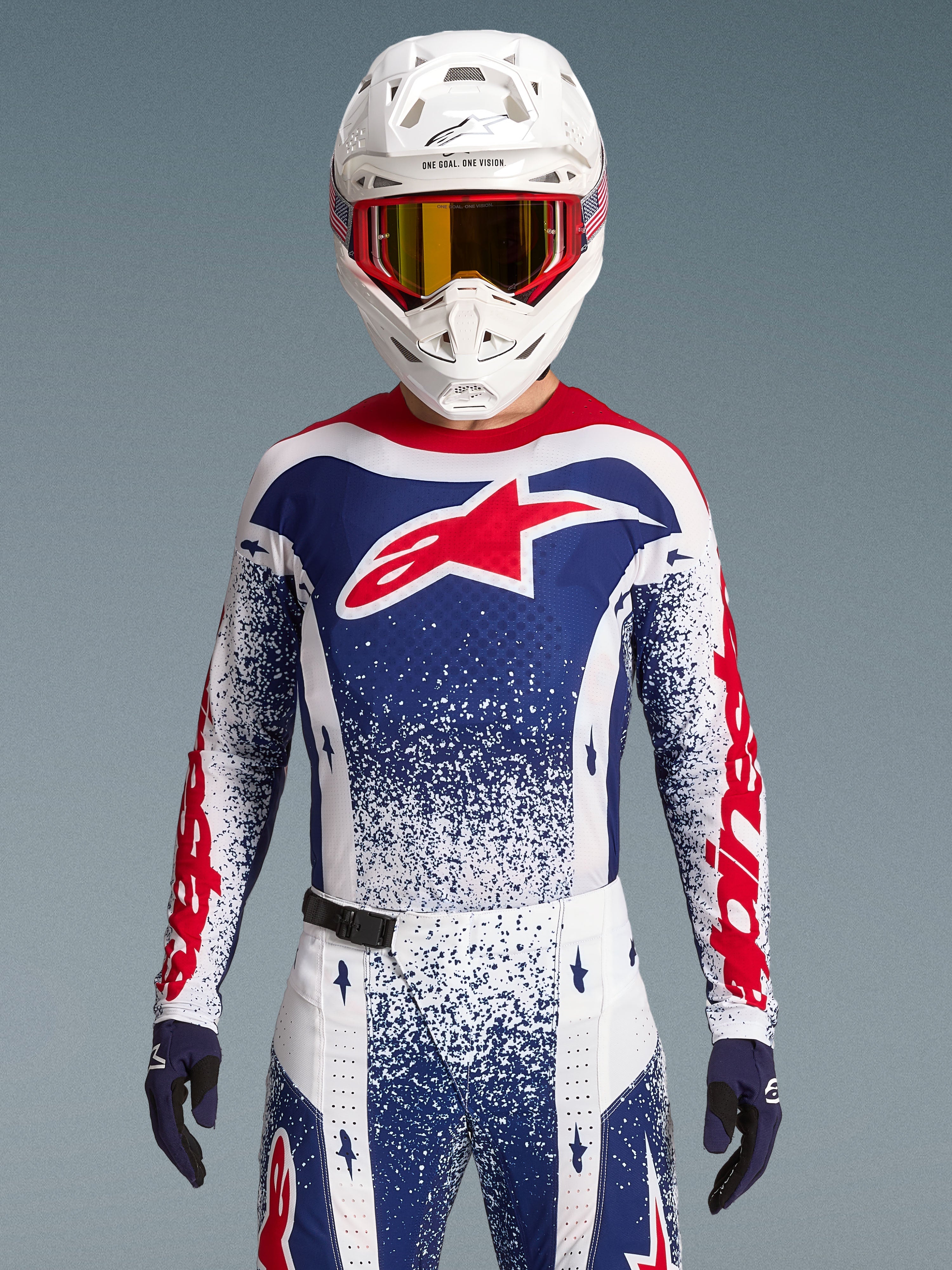 Alpinestars Techstar Unity Bekleidungsset Limited Edition, Motocross-Trikot und Hose, Rot, Weiß, Blau, athletische Passform.