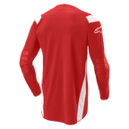 Alpinestars Techdura Jersey, Motocross- und Enduro-Jersey, Leuchtendes Rot mit weißen Einsätzen, Rückansicht mit verlängertem Rückenteil und verstärkten Ellbogen, weißes Alpinestars-Logo auf dem Ärmel, strapazierfähige Offroad-Performance-Ausrüstung