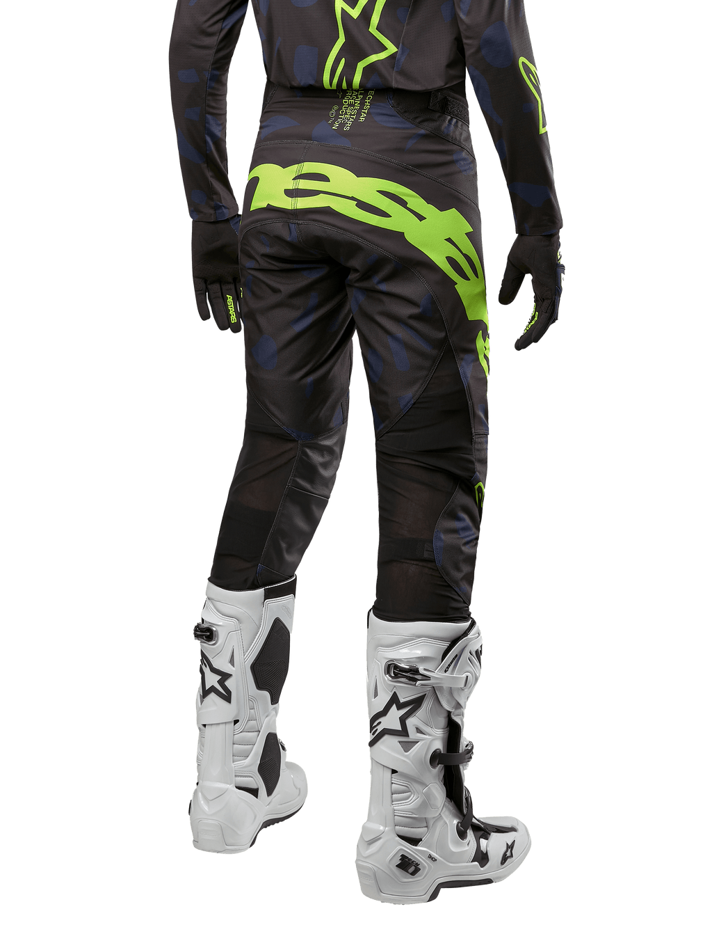 Alpinestars 2024 Techstar Rantera Hose, Motocross-Hose, Schwarz, Navy und Gelb Fluo, Rückansicht, mit auffälligem neongelbem Branding und Mesh-Belüftungseinsätzen, getragen mit passendem Jersey und weißen Stiefeln, strapazierfähige Ausrüstung für Motocross und Offroad-Rennsport