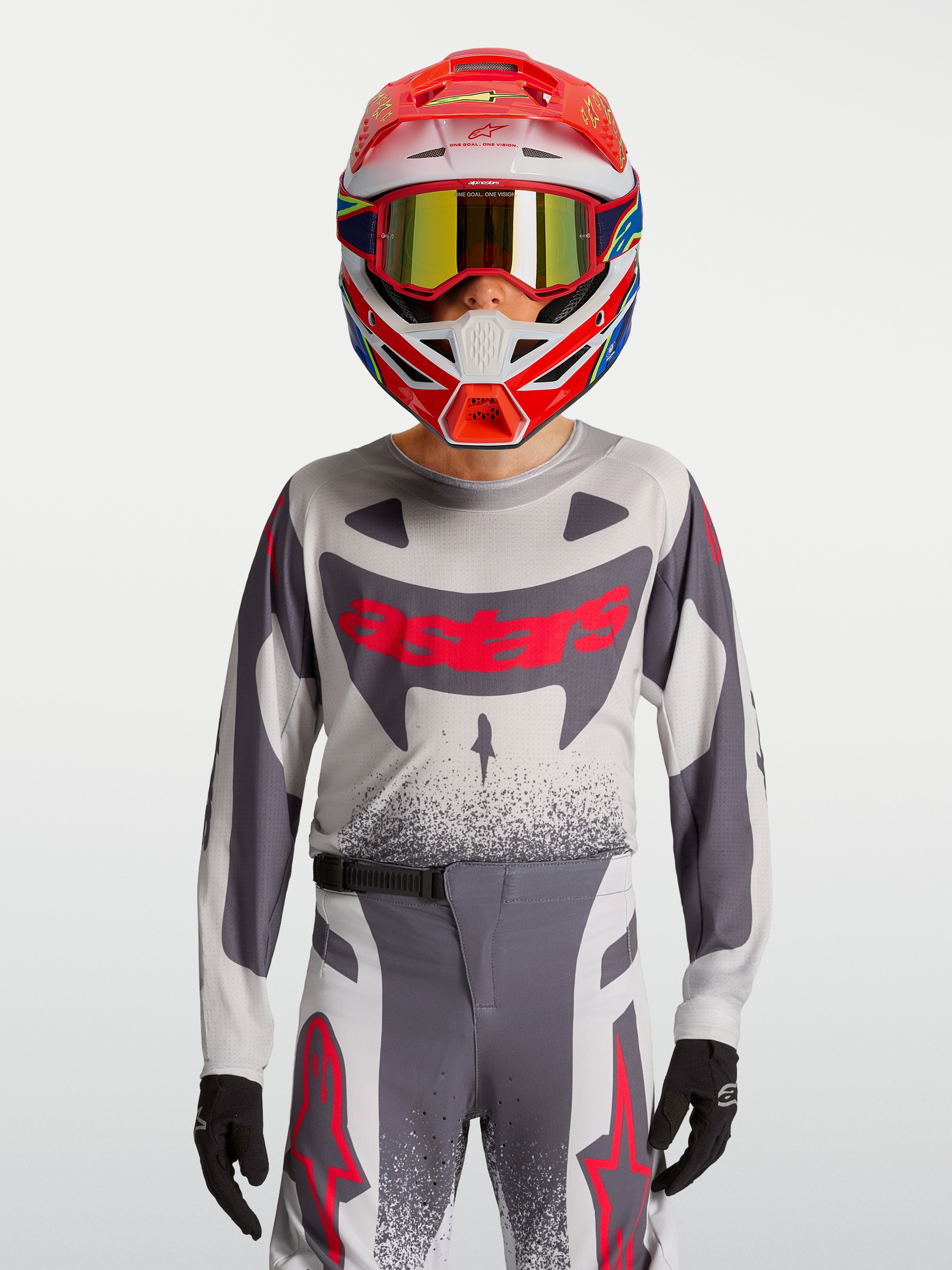 Alpinestars Supertech Swan Jugend-Trikot und Gear Set, grau-fluo-rote Motocross-Kombi aus atmungsaktivem Stretch-Mesh.