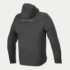 Alpinestars Domino Tech Jacket, Black, Rear view showing fixed hood and grey logo on the upper back, technical softshell motorcycle hoodie for urban riding