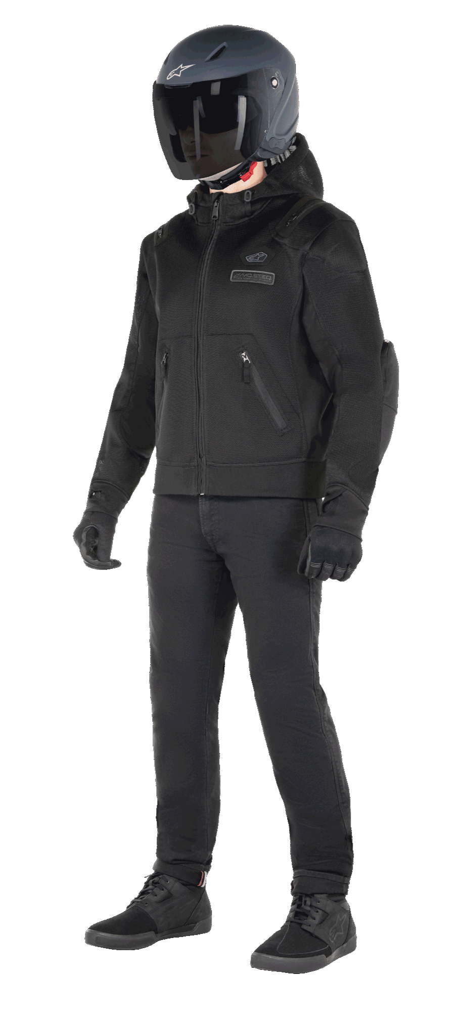 Alpinestars Moflow Air Tech Hoodie, Urban Motorcycle Hoodie, Black Black, worn by a rider with a matte black helmet, black gloves, and riding pants, featuring a full mesh construction for airflow, zippered pockets, and subtle chest logos, sleek casual design for warm weather street riding.