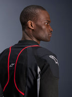 Alpinestars Troop-Air Pro Jacket, technical armored air jacket, Black Ash Gray and Bright Red, close-up profile and back view showing mesh textile panels, red piping accents, and white Astars logos on the shoulder and upper back