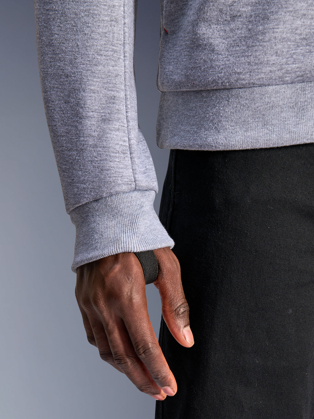 Alpinestars Chrome V2 Sport Hoodie, Gray Heather, close-up of ribbed sleeve cuff with integrated black thumb loop for secure fit, tech fleece material, urban motorcycle gear