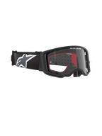 Alpinestars Supertech Corp Goggles, Motocross-Brille, schwarzer Rahmen mit klarem Glas, verstellbares schwarzes Band mit großem weißen Alpinestars Stern-Logo, rote Schaumstoff-Innenakzente, professioneller Augenschutz für Offroad-Rennsport