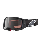 Alpinestars Supertech Corp Goggles Absolute Vision, Motocross Goggles, Black and Grey with Mirror Silver Lens, featuring an angular frame, adjustable black strap with a prominent white star logo, and multi-layer face foam for off-road performance.