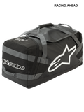 Alpinestars Goanna Bag, Motocross Duffle Bag, Black and Anthracite Gray with White logos, features large side star logo and wordmark, durable tarpaulin base, reinforced carry straps, large gear storage for off-road racing