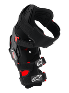Alpinestars RK-7 Plasma Knee Brace, Motocross Knee Protector, Black and Red, side view featuring the asymmetric fiber-reinforced frame, four-point hinge system, and padded X-straps with white Astar logos