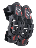 Alpinestars Youth Bionic 5S Knieorthesen, Motocross-Knieschutz, Schwarz und Rot, Paar Protektoren mit Hybrid-Rahmendesign und belüfteten Schalen, weißes Astar-Logo oben, rotes ASTARS-Branding unten und verstellbare schwarze Riemen für sicheren Halt.
