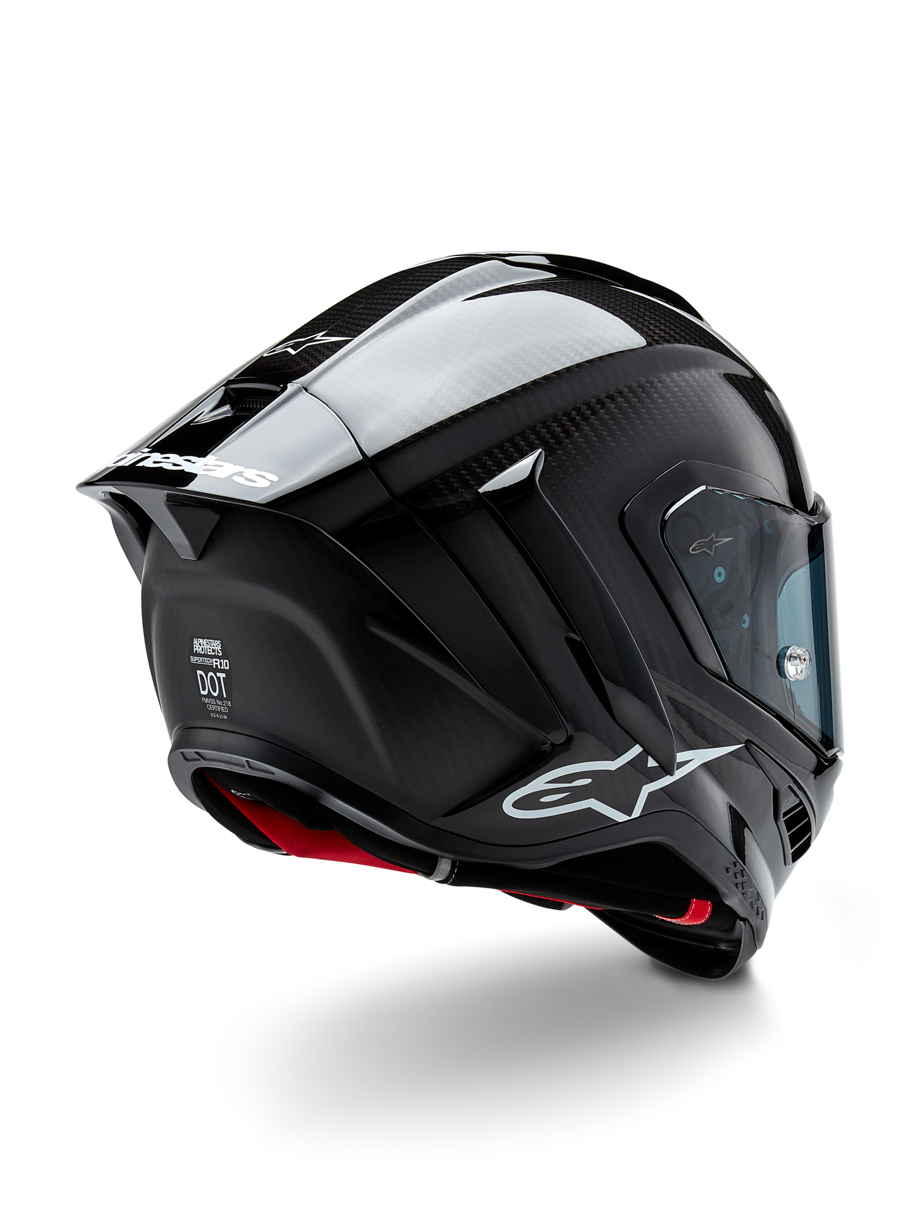 Alpinestars Supertech R10 Solid Helmet, Motorcycle Racing Helmet, Black Carbon Matte and Glossy finish, rear three-quarter view showing carbon fiber shell, aerodynamic spoiler, and Alpinestars branding.