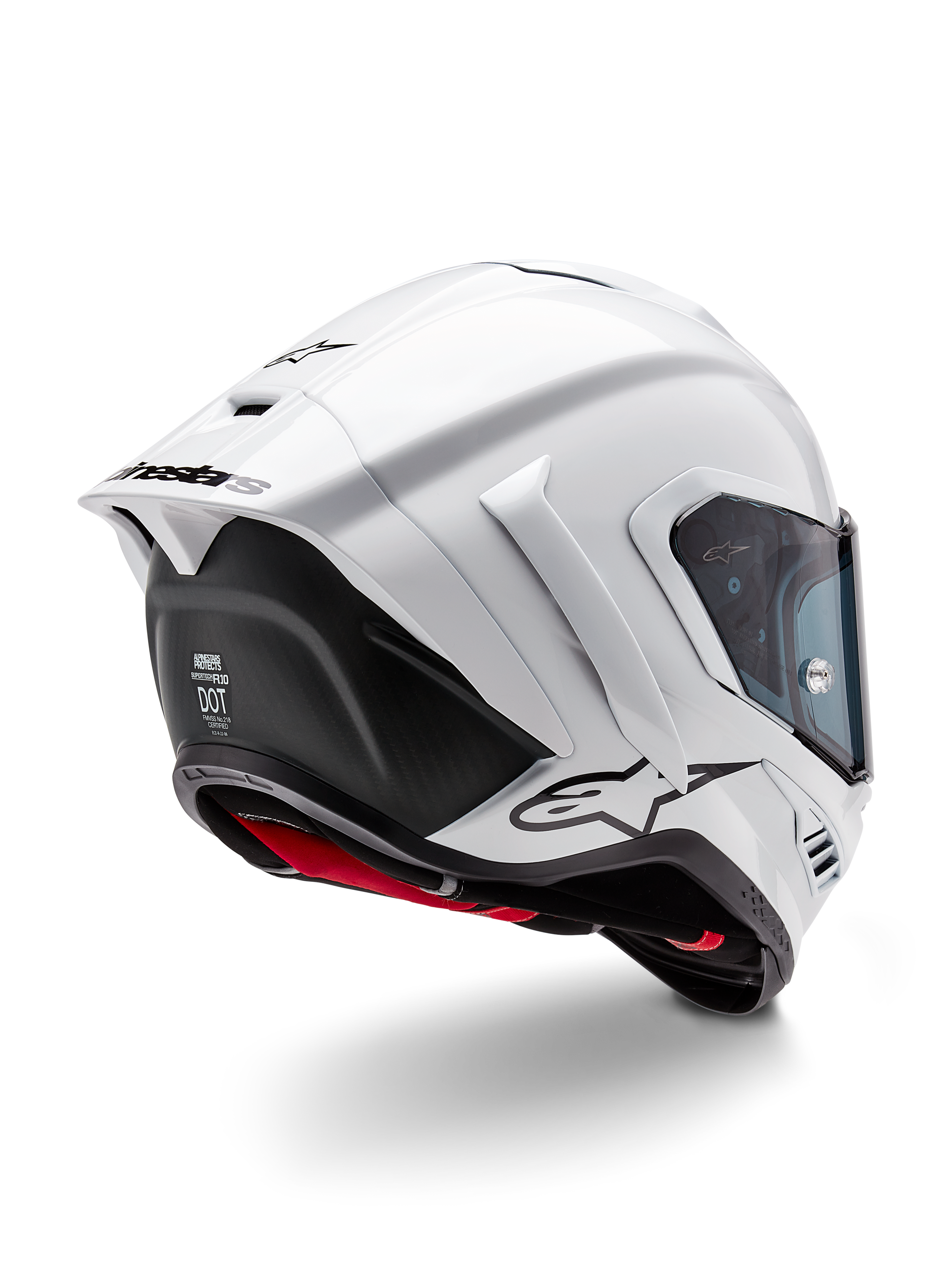 Alpinestars Supertech R10 Solid Helmet, full-face motorcycle racing helmet, White Glossy and Black Matte, rear three-quarter view featuring aerodynamic spoiler, side winglets, and black logo branding