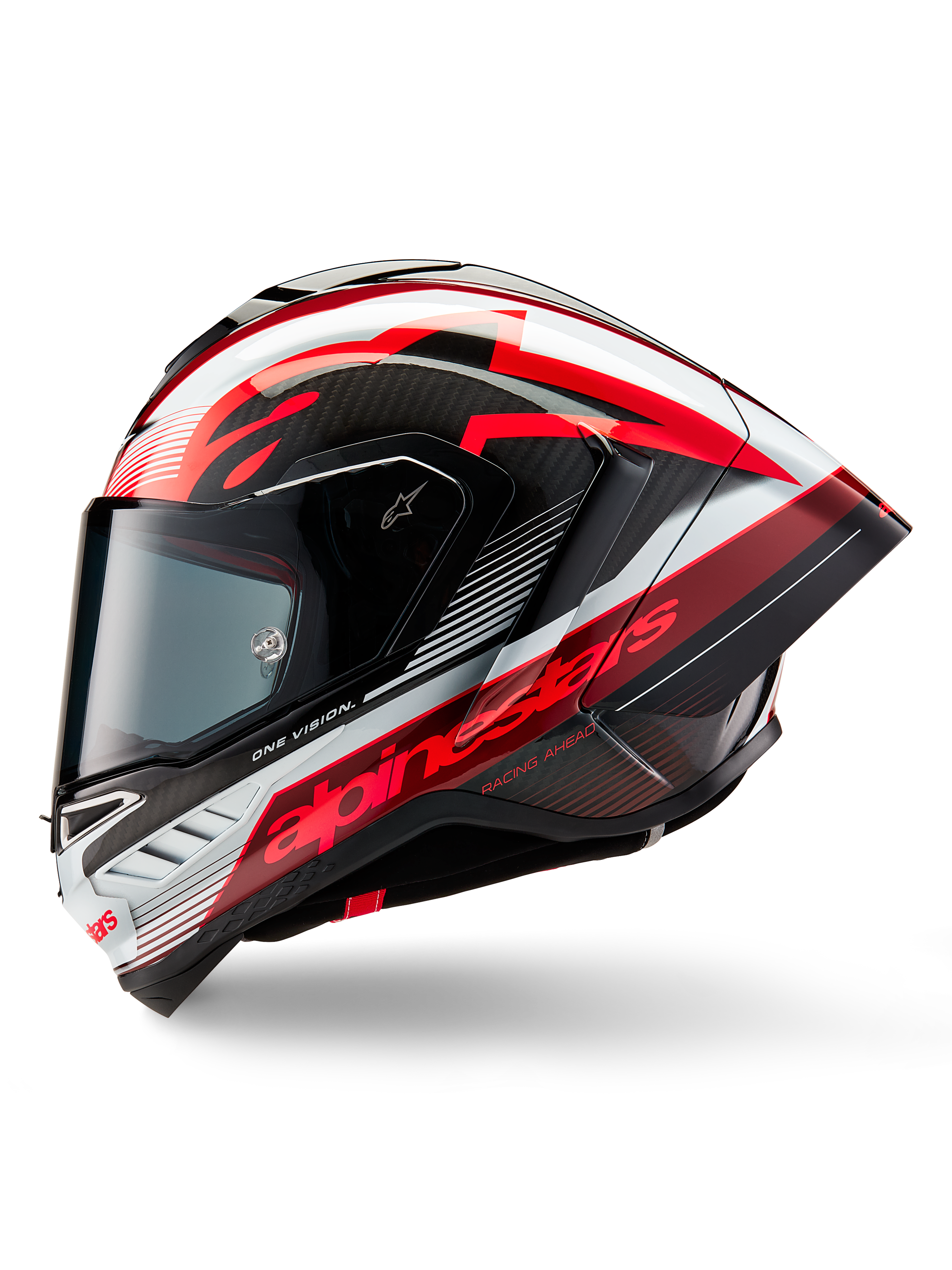 Alpinestars Supertech R10 Team Helm, Integral-Motorrad-Rennhelm, glänzendes Finish in Schwarz-Carbon, Rot und Weiß, Seitenprofil mit aerodynamischem Design, markantes rotes Branding mit 'One Vision' und 'Racing Ahead' Text, elegante Carbonfaser-Konstruktion für professionelle Performance.