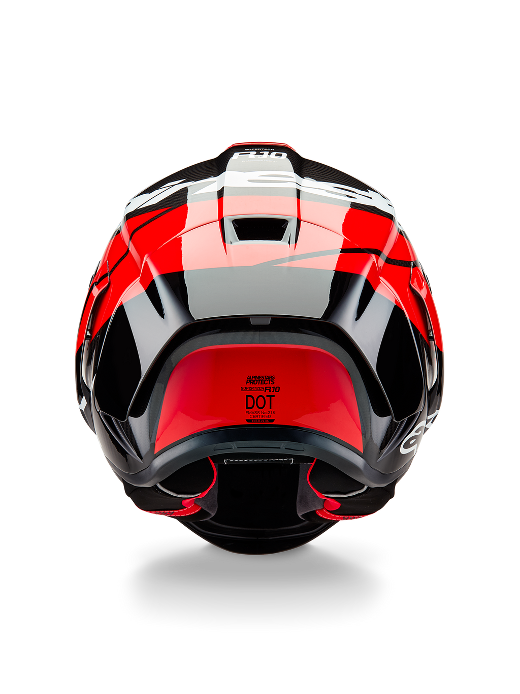 Alpinestars Supertech R10 Element Helm, Rückansicht, Schwarz-Carbon mit leuchtend roten und weißen glänzenden Akzenten, mit aerodynamischem Heckspoiler, Entlüftungsöffnungen und DOT-Zertifizierungslabel, elegantes, vom Rennsport inspiriertes Design mit Carbonfaser-Details