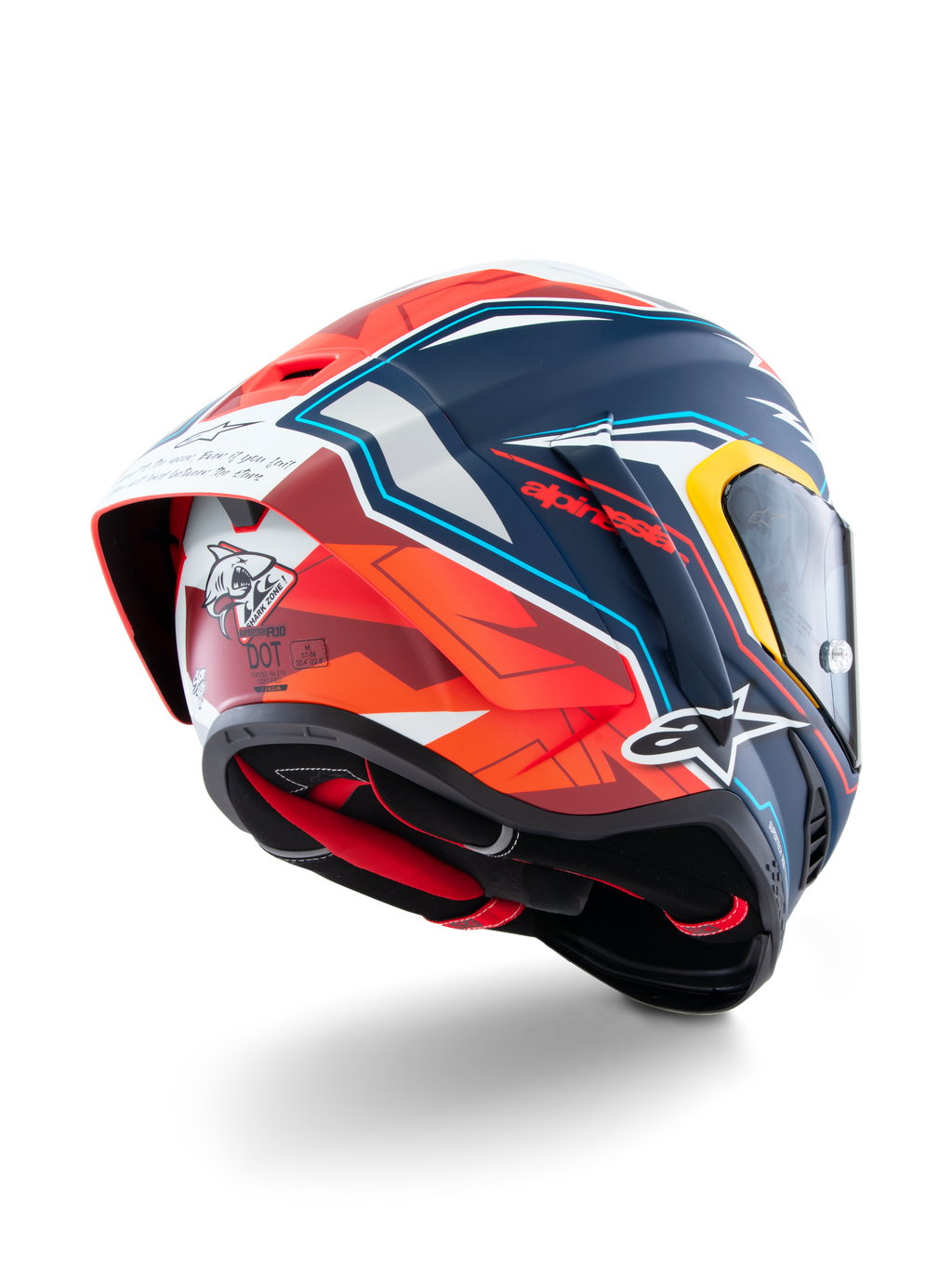 Alpinestars Supertech R10 Acosta Limited Edition Helm, Ansicht von schräg hinten, mattes Finish in Blau, Rot und Weiß, mit aerodynamischem Spoiler, Haifisch-Grafik auf der Rückseite, Alpinestars-Logos und DOT-Zertifizierung, Hochleistungs-Rennmotorradhelm