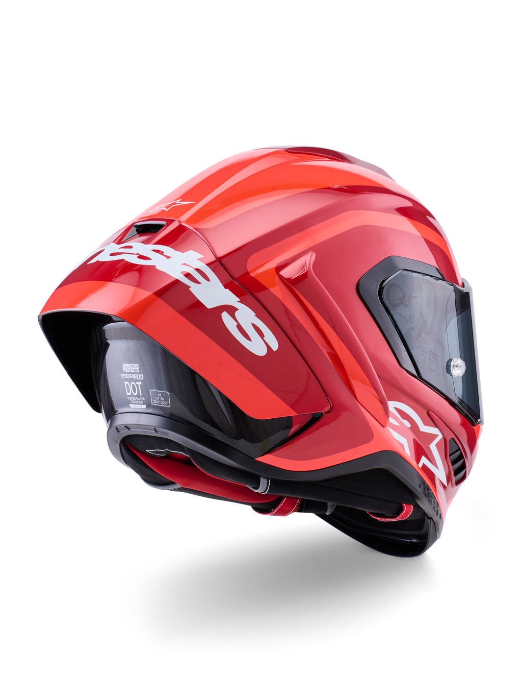Alpinestars Supertech R10 Arius Helm, Glänzendes Rot mit weißem Branding, rückwärtige Dreiviertel-Ansicht mit aerodynamischem Spoiler, Carbonfaser-Schalenkonstruktion und schlankem Rennprofil mit dunklem Visier