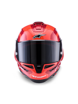 Alpinestars Supertech R10 Arius Helm, Integral-Rennhelm, Rot mit weißen und schwarzen Akzenten, Vorderansicht mit dunkel getöntem Visier, Alpinestars-Branding auf der Stirn und am Kinn, glänzendes Finish mit aerodynamischen Belüftungsöffnungen.