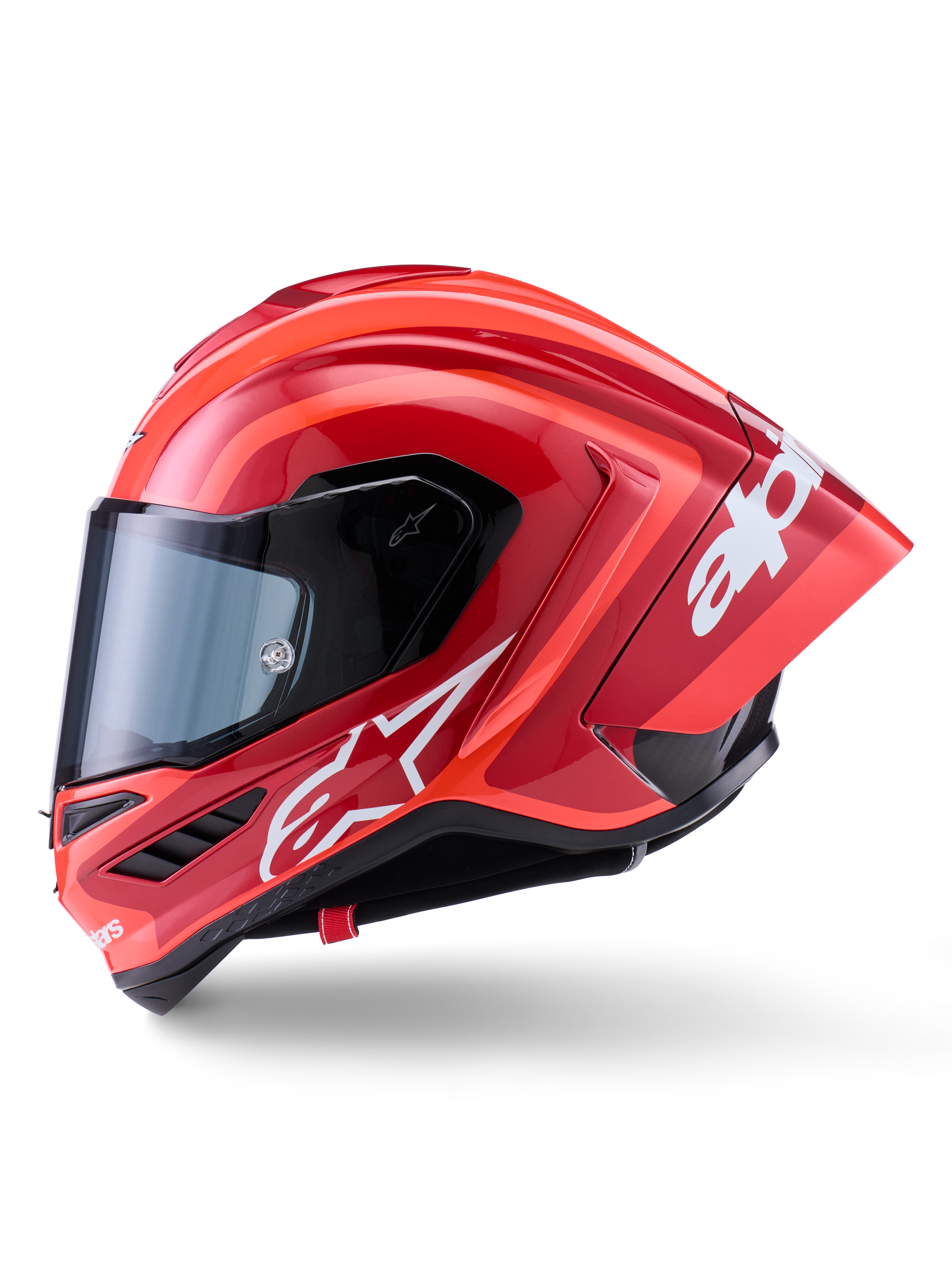 Alpinestars Supertech R10 Arius Helm, Integral-Rennhelm, Glänzendes Rot mit weißen Logo-Grafiken, Seitenprofilansicht mit Fokus auf den aerodynamischen Spoiler und das klare Visier, Carbon-Multi-Composite-Schale für den professionellen Motorsport