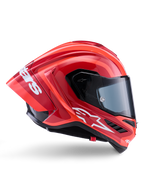 Alpinestars Supertech R10 Arius Helm, Integral-Rennhelm, Glänzendes Rot und Orange, Seitenprofilansicht mit aerodynamischem Heckspoiler, weißem Astars-Logo am Kinn und klarem Visier, entwickelt für High-Speed-Performance auf der Rennstrecke