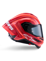 Alpinestars Supertech R10 Arius Helm, Integral-Rennhelm, Glänzendes Rot und Orange, Seitenprofilansicht mit aerodynamischem Heckspoiler, weißem Astars-Logo am Kinn und klarem Visier, entwickelt für High-Speed-Performance auf der Rennstrecke
