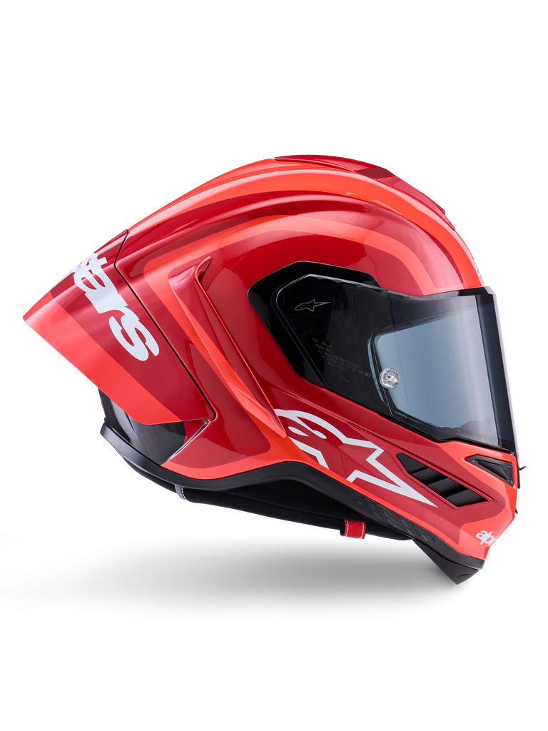 Alpinestars Supertech R10 Arius Helm, Integral-Rennhelm, Glänzendes Rot und Orange, Seitenprofilansicht mit aerodynamischem Heckspoiler, weißem Astars-Logo am Kinn und klarem Visier, entwickelt für High-Speed-Performance auf der Rennstrecke
