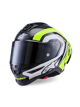 Alpinestars Supertech R10 Arius Helm, professioneller Motorrad-Rennhelm, glänzendes schwarzes Carbon mit Akzenten in Silber und fluoreszierendem Gelb, mit dunkel getöntem Visier, aerodynamischen Winglets und markantem Alpinestars-Branding