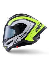 Alpinestars Supertech R10 Arius Helm, Rennsport-Motorradhelm, Schwarz, Silber und Gelb Fluo Glänzend, Seitenansicht, aerodynamischer Heckspoiler, Carbonfaser-Konstruktion, markantes Branding und getöntes Visier.
