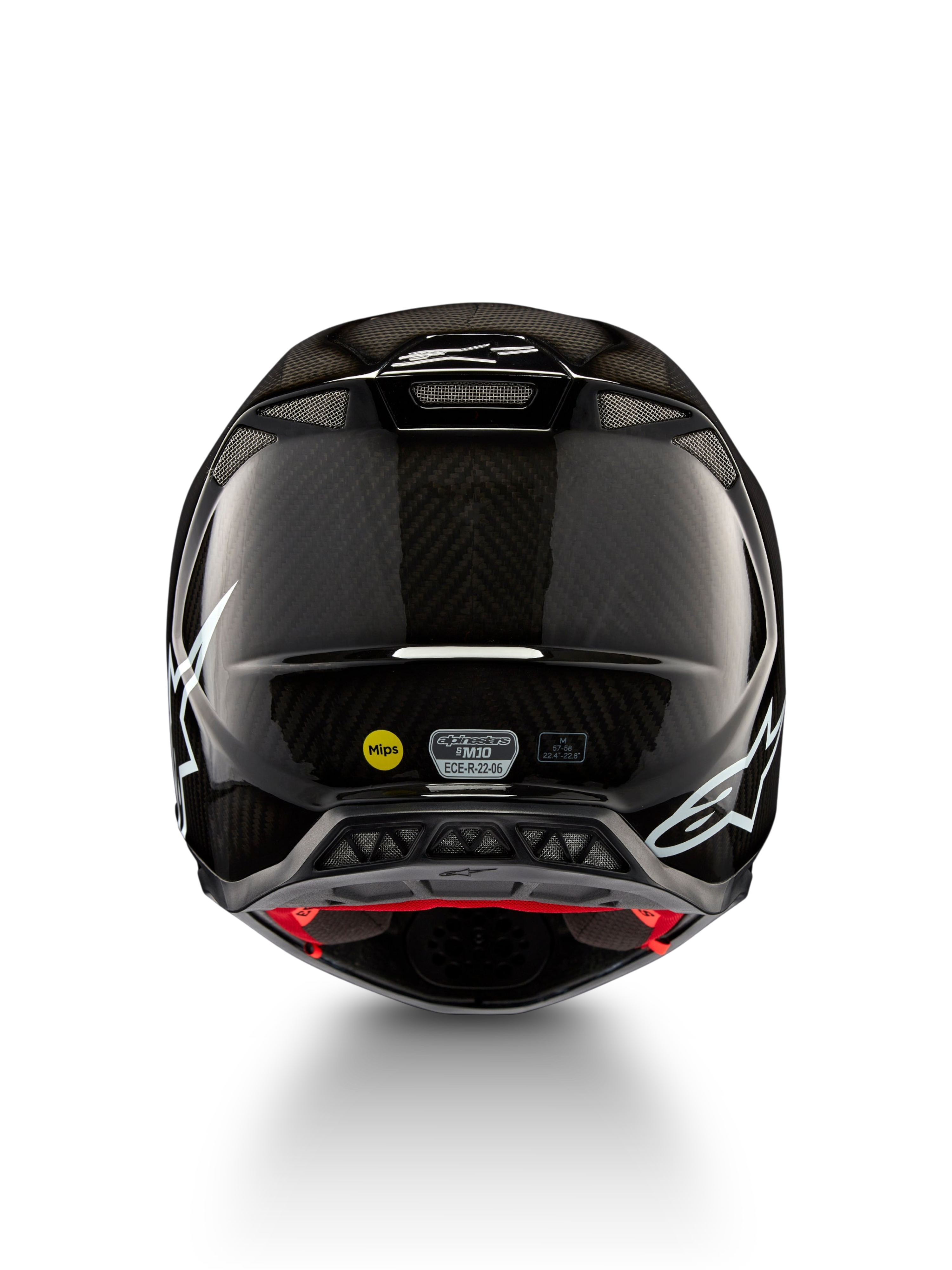 Alpinestars Supertech M10 Solid Helm ECE 22.06, schwarzer glänzender Carbon-Motocross-Helm mit weißen Grafiken, Rückansicht mit Belüftungsöffnungen sowie sichtbaren MIPS- und ECE-R-22.06-Kennzeichnungen