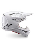 Alpinestars Supertech M10 Solid Helmet ECE 22.06, white glossy motocross helmet with black logo, peak visor and ventilated full-face design, side view