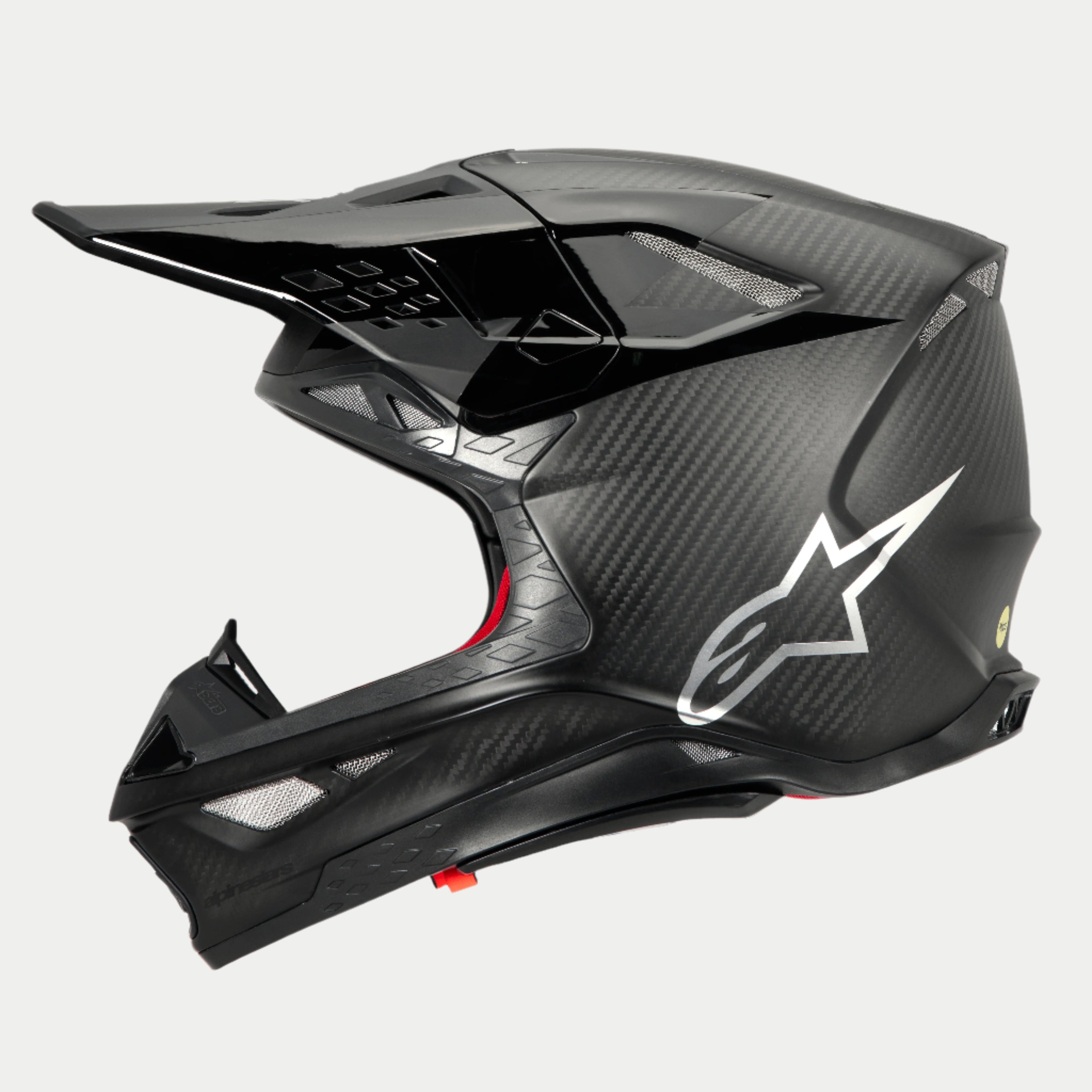 Alpinestars Supertech M10 Fame ECE 22.06 Helm, Seitenansicht, mattes und glänzendes Carbon-Finish in Schwarz, sichtbare Kohlefaserstruktur, silbernes Astars-Logo an der Seite, aerodynamisches Design mit integrierten Belüftungsöffnungen und schwarzem Visier