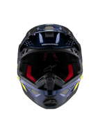Alpinestars Supertech M10 TLD Edition 25 Helm, Motocross-Helm, Glänzendes Metallic-Dunkelblau mit roter Innenpolsterung, Vorderansicht mit Belüftungsgittern und Seitengrafiken in Gelb und Orange, hochwertiger Offroad-Rennschutz.