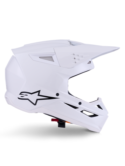Alpinestars S-M3 Solid Helm, Motocross-Helm, Glänzend Weiß, Seitenansicht mit schwarzem Stern-Logo, kantige aerodynamische Schale, mehrere Belüftungsöffnungen, integriertes Visier und Kinnschutz, Offroad-Rennschutz