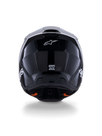 Alpinestars S-M3 Radium Helm ECE 22.06, Motocross-Helm, Schwarz Weiß Grau Glänzend, Rückansicht mit glänzendem schwarzen Finish, Alpinestars Stern-Logo, Belüftungsauslässe und ECE-Zertifizierungsetikett.