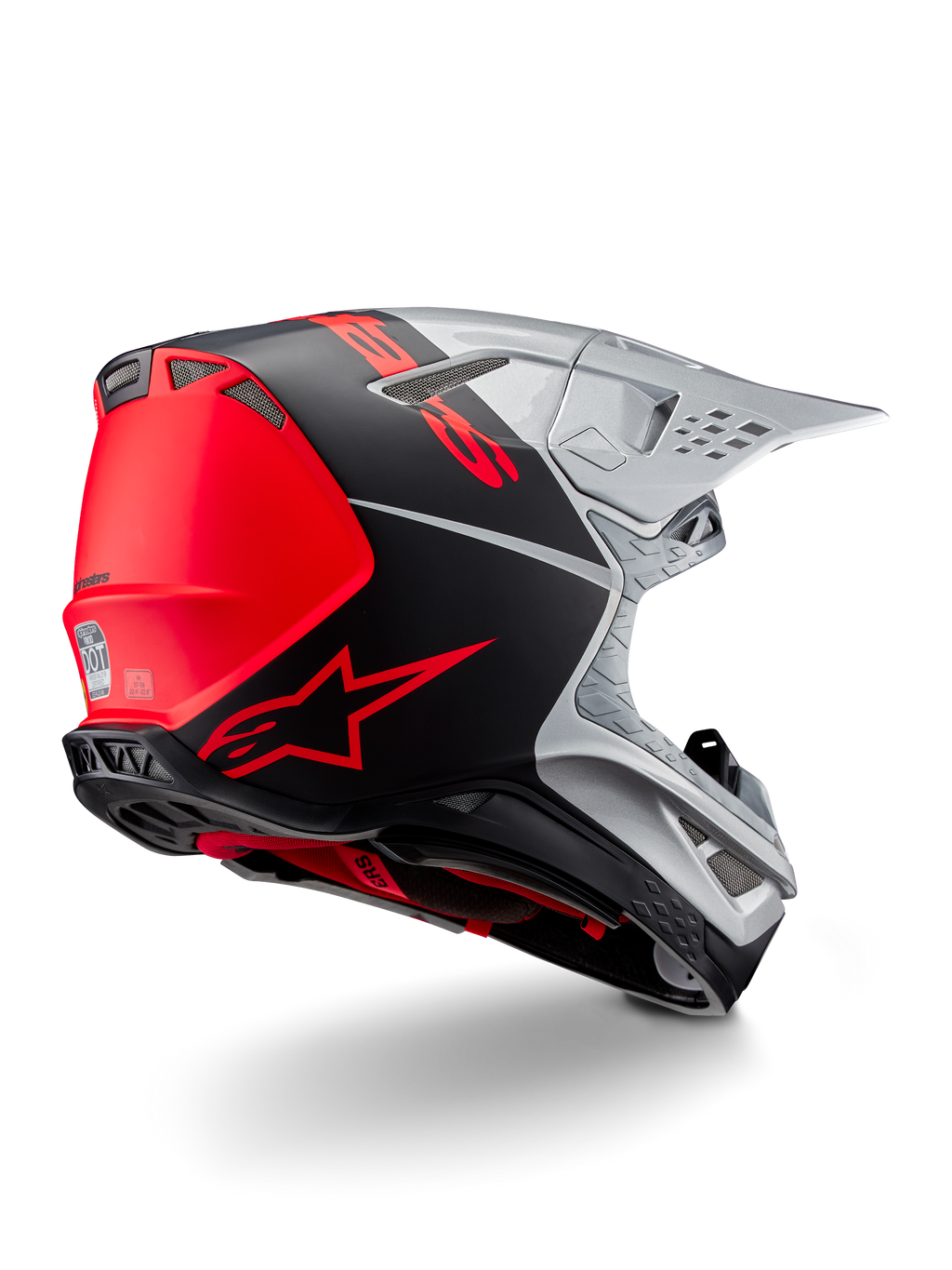 Alpinestars Supertech M10 Flood ECE 22.06 Helm, Motocross-Helm, Silber, Schwarz und Fluo-Orange, Rück-Seitenansicht zur Hervorhebung des aerodynamischen Schalendesigns, der Belüftungsöffnungen und des matt-glänzenden Finishs