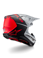 Alpinestars Supertech M10 Flood ECE 22.06 Helm, Motocross-Helm, Silber, Schwarz und Fluo-Orange, Rück-Seitenansicht zur Hervorhebung des aerodynamischen Schalendesigns, der Belüftungsöffnungen und des matt-glänzenden Finishs