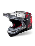 Alpinestars Supertech M10 Flood ECE 22.06 Helm, Motocross-Helm, Silber, Schwarz und Fluo-Orange, mattes und glänzendes Finish, mit einer eleganten Carbon-Schale, markantem Alpinestars-Branding und mehreren Belüftungsöffnungen
