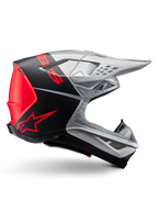 Alpinestars Supertech M10 Flood ECE 22.06 Helm, Motocross-Helm, Silber, Schwarz und Fluo-Orange, mattes und glänzendes Finish, aerodynamisches Profil mit Multi-Composite-Schale, markantes Branding mit orangefarbenem Alpinestars-Logo, High-Flow-Belüftungsöffnungen und schützendes Visier