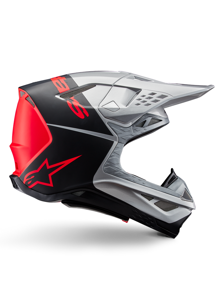 Alpinestars Supertech M10 Flood ECE 22.06 Helm, Motocross-Helm, Silber, Schwarz und Fluo-Orange, mattes und glänzendes Finish, aerodynamisches Profil mit Multi-Composite-Schale, markantes Branding mit orangefarbenem Alpinestars-Logo, High-Flow-Belüftungsöffnungen und schützendes Visier