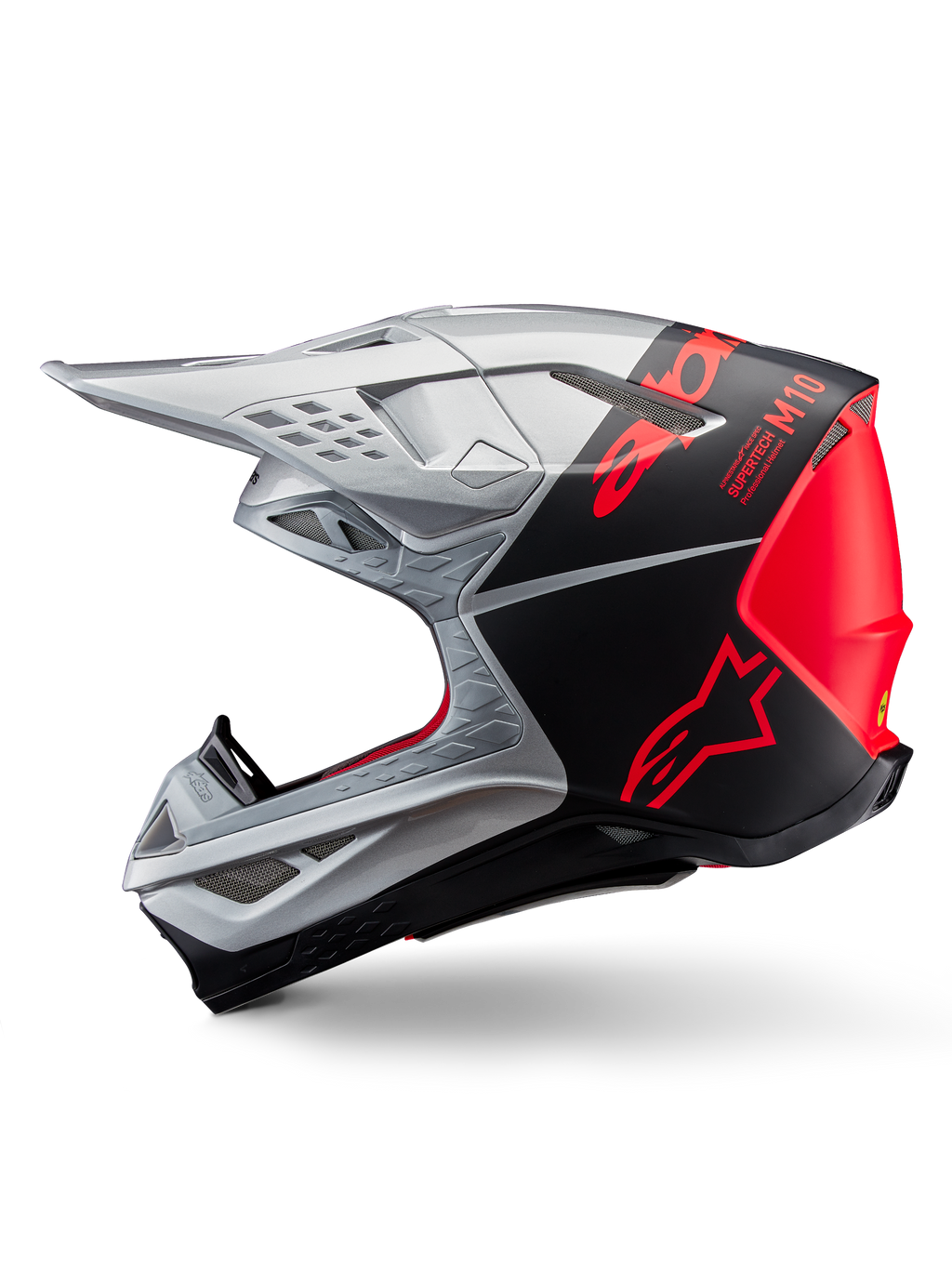 Alpinestars Supertech M10 Flood Helm, Motocross-Helm, Silber und Schwarz mit fluoreszierenden orangefarbenen Akzenten, Seitenprofil, schlankes aerodynamisches Design mit Belüftungsöffnungen, mattes und glänzendes Finish, professioneller Offroad-Rennschutz