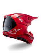 Alpinestars Supertech M10 Flood Helm, Motocross-Helm, Rot und Fluo-Rot, mattes und glänzendes Finish, Rückansicht im Profil mit weißem Alpinestars-Logo und Karbonfaser-Akzenten, aerodynamisches Design mit mehreren Belüftungsöffnungen, leistungsstarker Offroad-Kopfschutz