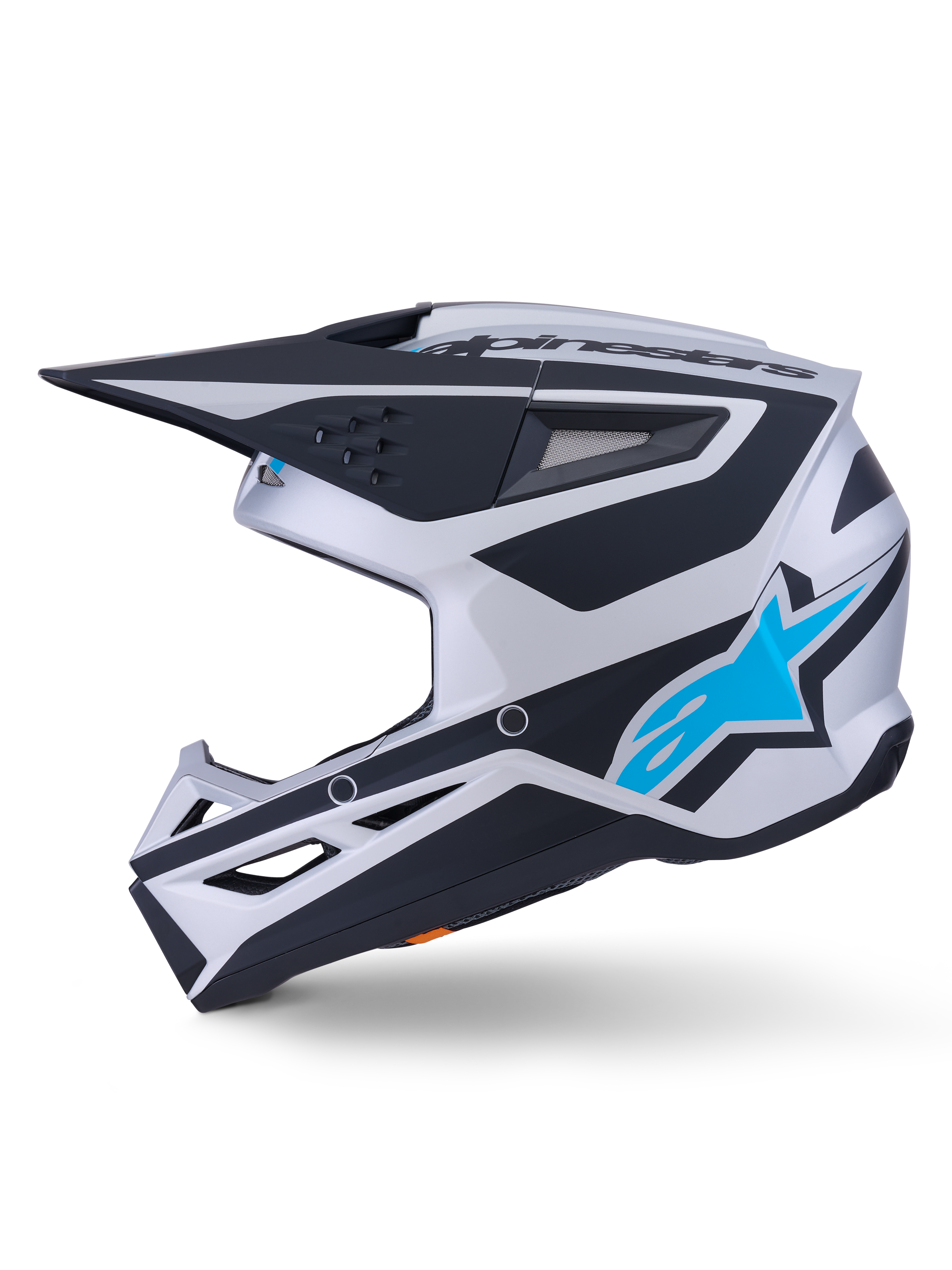 Alpinestars S-M3 Heat Helm ECE 22.06, Motocross-Helm, Silber, Blau und Schwarz mit mattem Finish, Seitenansicht, leuchtend blaues Alpinestars Stern-Logo, schwarzes Visier, mehrere Belüftungsöffnungen, aggressives aerodynamisches Design für den Offroad-Rennsport