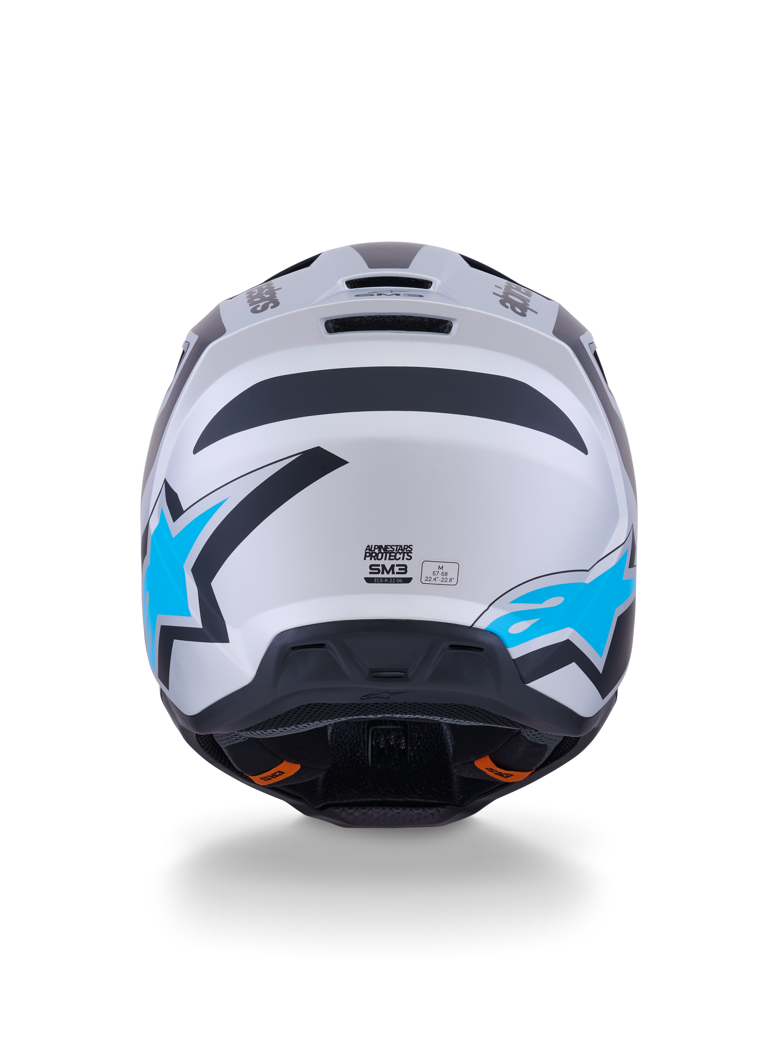 Alpinestars S-M3 Heat Helm, Motocross-Helm, Silber, Blau und Schwarz Matt, Rückansicht mit leuchtend blauen Stern-Logos, mattem Finish und integrierten Belüftungsöffnungen.