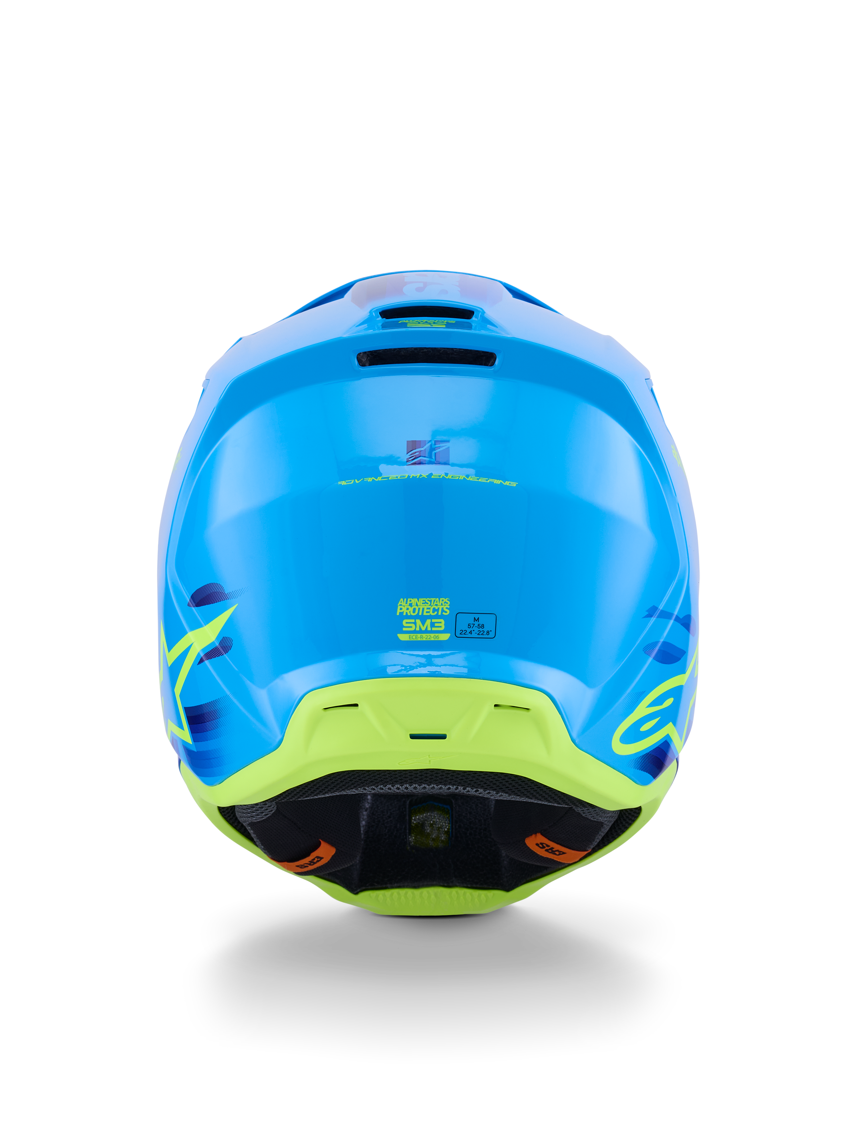Alpinestars S-M3 Force OCD Helm, Motocross-Helm, Cyan Glänzend mit limettengrünen und gelben Akzenten, Rückansicht mit Fokus auf aerodynamischer Schalenkonstruktion, Auslassöffnungen und ECE 22.06 Sicherheitskennzeichnungen.