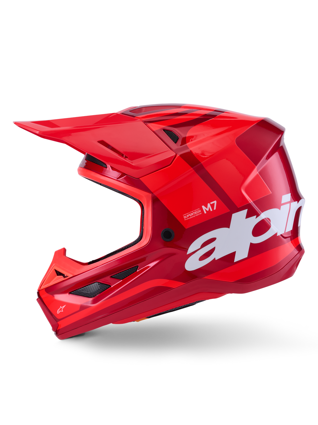 Alpinestars S-M7 Core Helm, Rot glänzend mit geometrischen Akzenten, Motocross-Helm, Seitenansicht, aerodynamische Schale mit Belüftungsöffnungen und weißem Branding, Hochleistungs-Offroad-Rennausrüstung