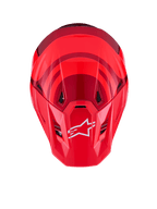 Alpinestars S-M7 Core Helm, Rot Glänzend, Draufsicht mit aerodynamischer Schale und dunkelroten Akzenten, weißes A-Star-Logo auf dem Visier, integrierte Belüftungsöffnungen, Hochleistungs-Motocross-Schutzausrüstung