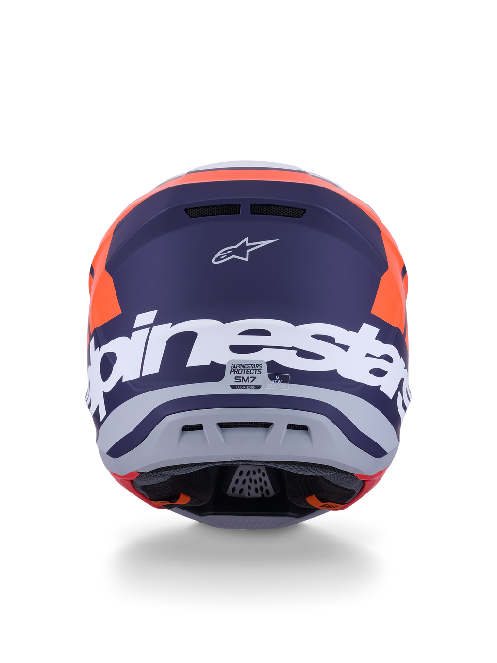 Alpinestars S-M7 Core Helm ECE 22.06, Motocross-Helm, Orange und Blau Matt, Rückansicht mit großem weißem Alpinestars-Schriftzug und Astars-Logo, schlankes aerodynamisches Design mit integrierten Belüftungsöffnungen, professioneller Offroad-Schutz