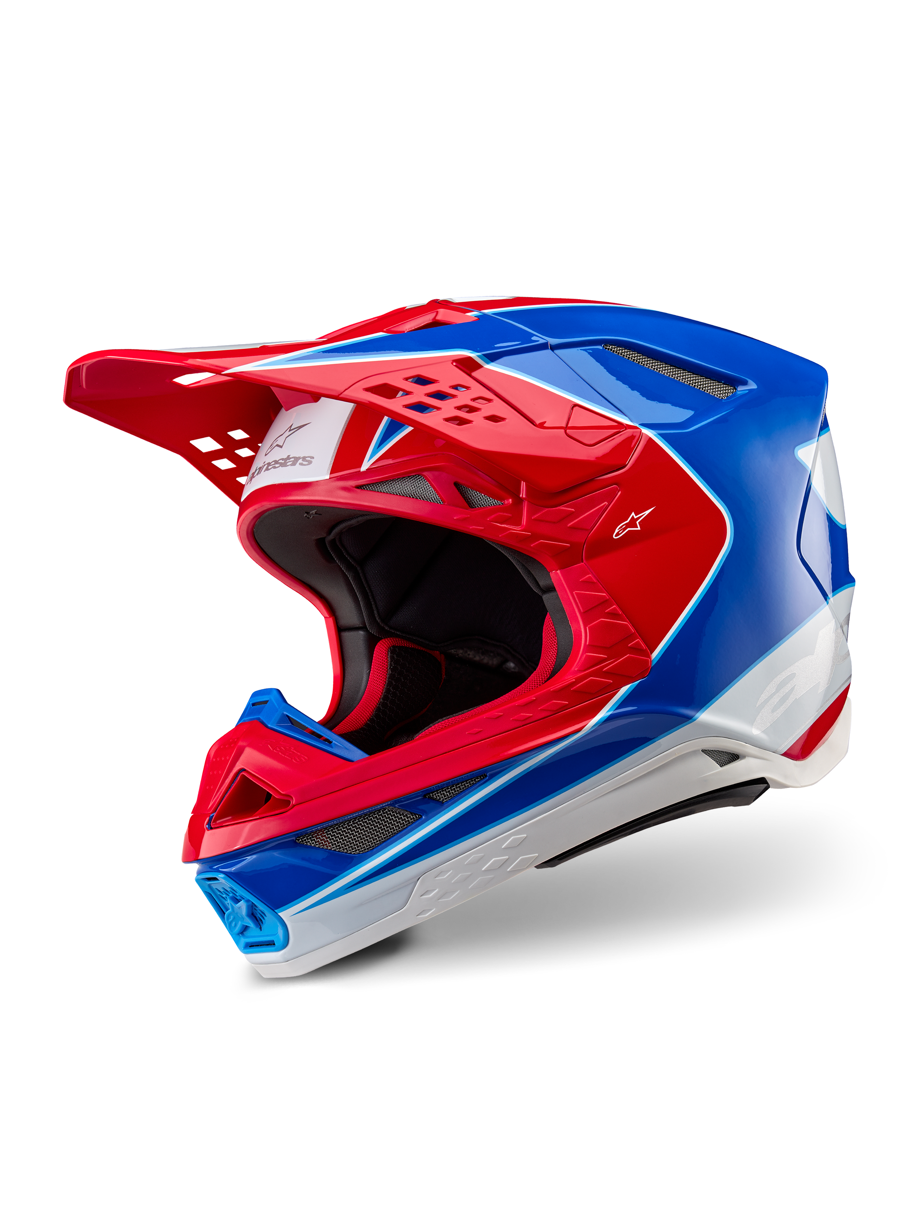 Alpinestars Supertech M10 Aeon Helm, Motocross-Helm, Hellrot-Blau Glänzend, Dreiviertelansicht mit aerodynamischer Schale und mehreren Belüftungsöffnungen, weiße und rote grafische Akzente, Alpinestars-Logo auf Visier und Seite, professionelle Offroad-Rennausrüstung