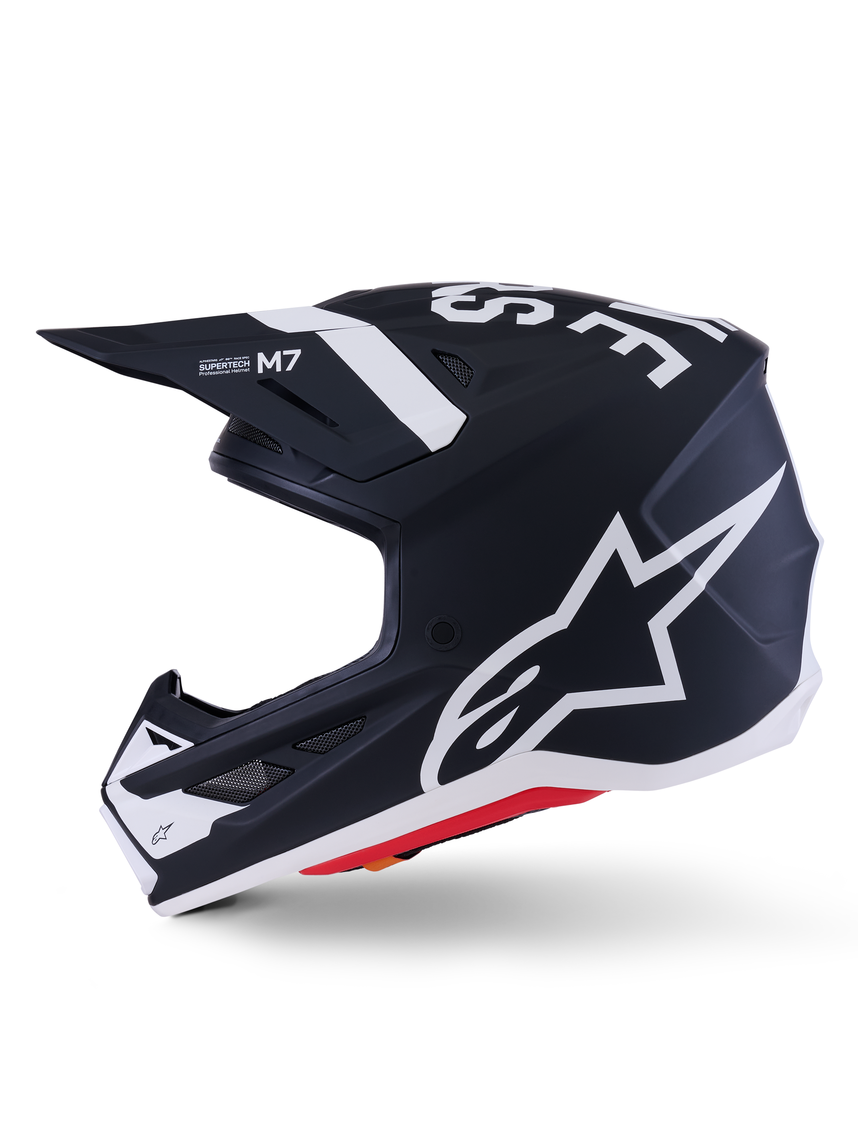 Alpinestars S-M7 Dasher Helmet ECE 22.06, Matte Black and White, side profile featuring large white Alpinestars logo, aerodynamic composite shell with ventilation ports and red base trim, professional motocross head protection