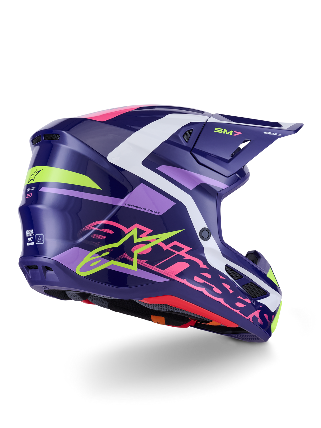 Alpinestars S-M7 Deed Helm, Motocross-Helm, Lila-Pink glänzend, Seiten-Rückansicht mit weißen und hellgrünen Akzenten, auffälliger pinkfarbener Alpinestars-Schriftzug und Stern-Logo, aerodynamisches Verbundschalendesign für Offroad-Performance